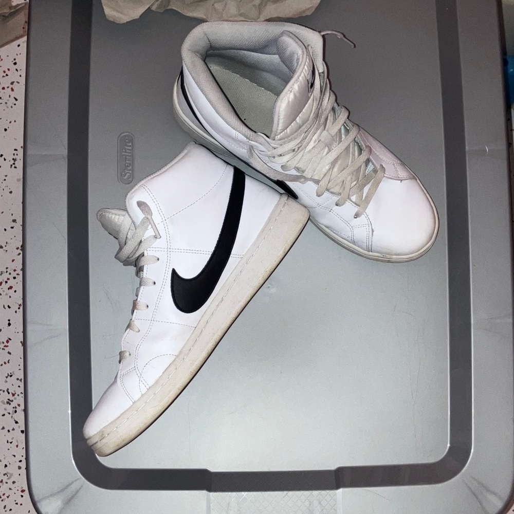 Nike White High-Top Sneakers with Black Logo